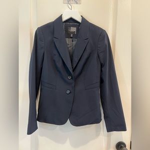 The limited navy suit jacket.